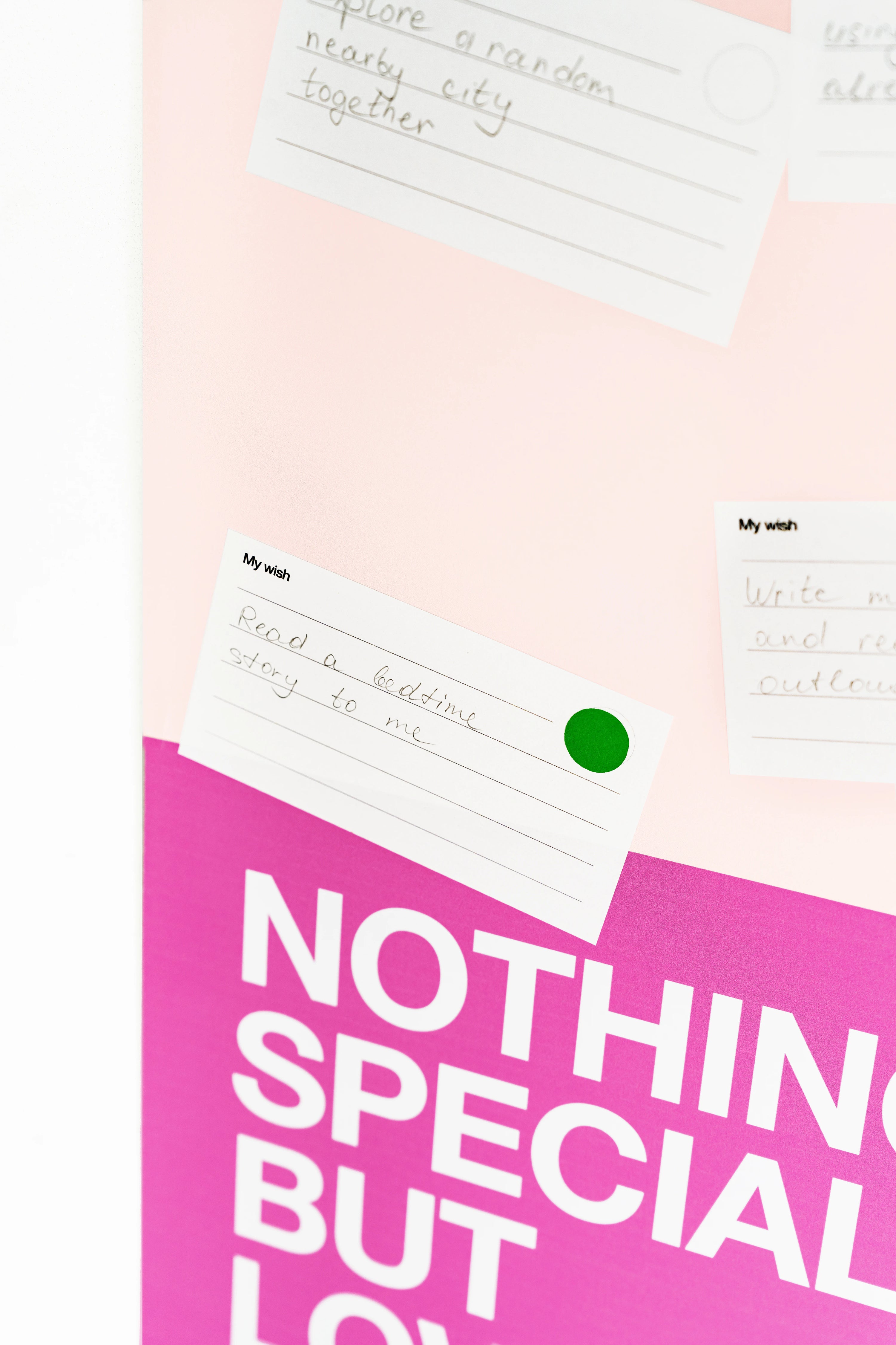 Note cards with handwritten text on a pink background with 'Nothing Special But Love' text.